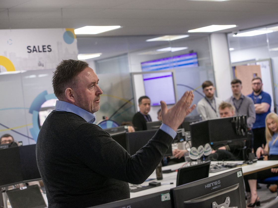 Chris presenting to the Lily team